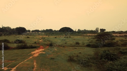 Aerial Shot Of Grassland Field Green Nature Scenic Beautiful Moody View 4K photo