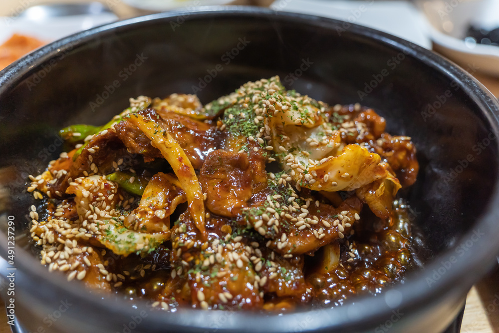 Stir-fried spicy pork with red pepper paste. It's a Korean dish. It's called Jeyukbokkeum Stir-fried spicy pork with red pepper paste. It's a Korean dish. It's called Jeyukbokkeum