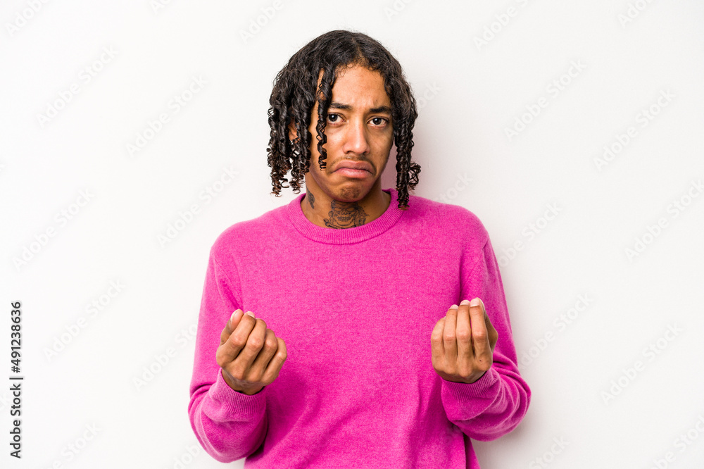 Young African American man isolated on white background showing that she has no money. Young African American man isolated on white background showing that she has no money.