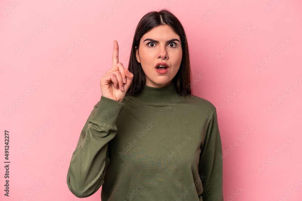 Young caucasian woman isolated on pink background having an idea, inspiration concept. Young caucasian woman isolated on pink background having an idea, inspiration concept.
