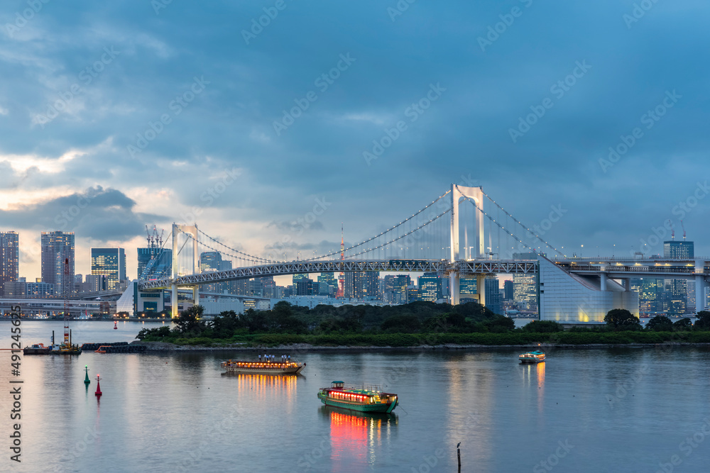 Japan, Kanto Region, Tokyo, View of Tokyo Bay and Rainbow Bridge at dusk Japan, Kanto Region, Tokyo, View of Tokyo Bay and Rainbow Bridge at dusk