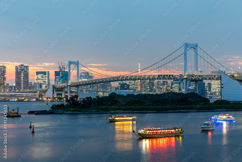 Japan, Kanto Region, Tokyo, Long exposure of Tokyo Bay and Rainbow Bridge at dusk Japan, Kanto Region, Tokyo, Long exposure of Tokyo Bay and Rainbow Bridge at dusk