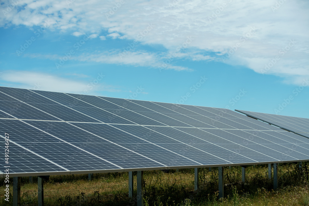 Field of solar panels to generate green and sustainable energy for the industries in the area. Field of solar panels to generate green and sustainable energy for the industries in the area.
