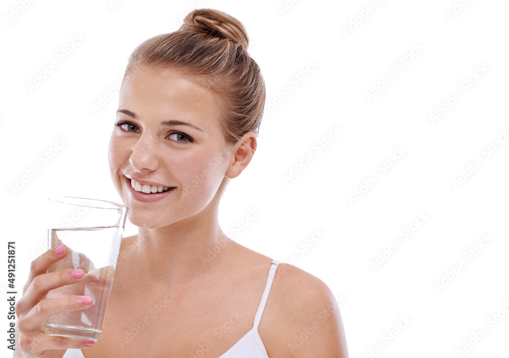 Its her beauty secret. A cute young girl with perfect skin drinking water while isolated on white. Its her beauty secret. A cute young girl with perfect skin drinking water while isolated on white.