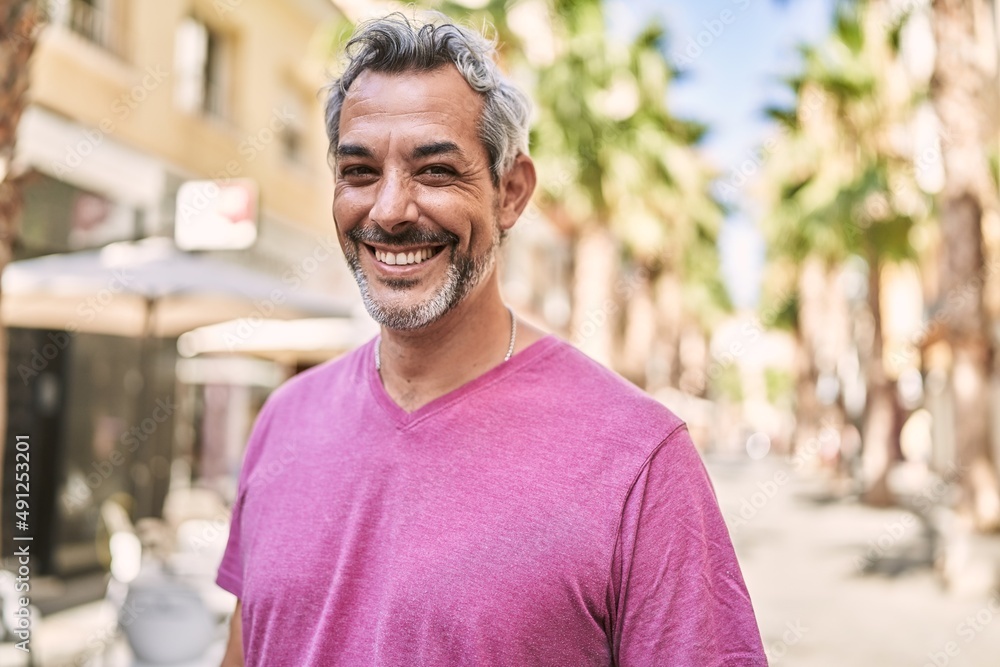 Middle age hispanic man smiling confident at street Middle age hispanic man smiling confident at street