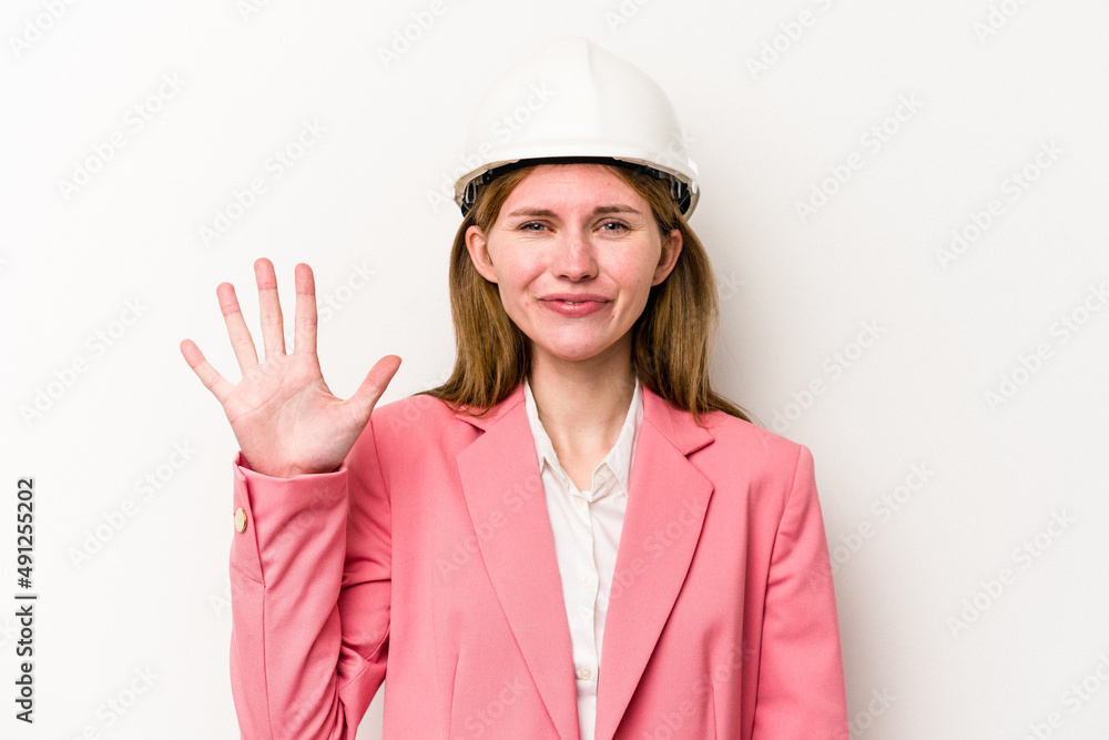 Young architect English woman with helmet isolated on white background smiling cheerful showing number five with fingers. Young architect English woman with helmet isolated on white background smiling cheerful showing number five with fingers.