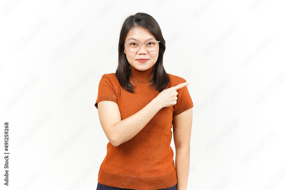 Showing Product and Pointing Side Of Beautiful Asian Woman Isolated On White Background Showing Product and Pointing Side Of Beautiful Asian Woman Isolated On White Background