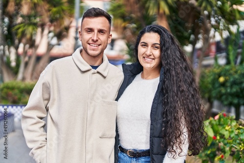 Man and woman couple smiling confident standing together at park © Krakenimages.com