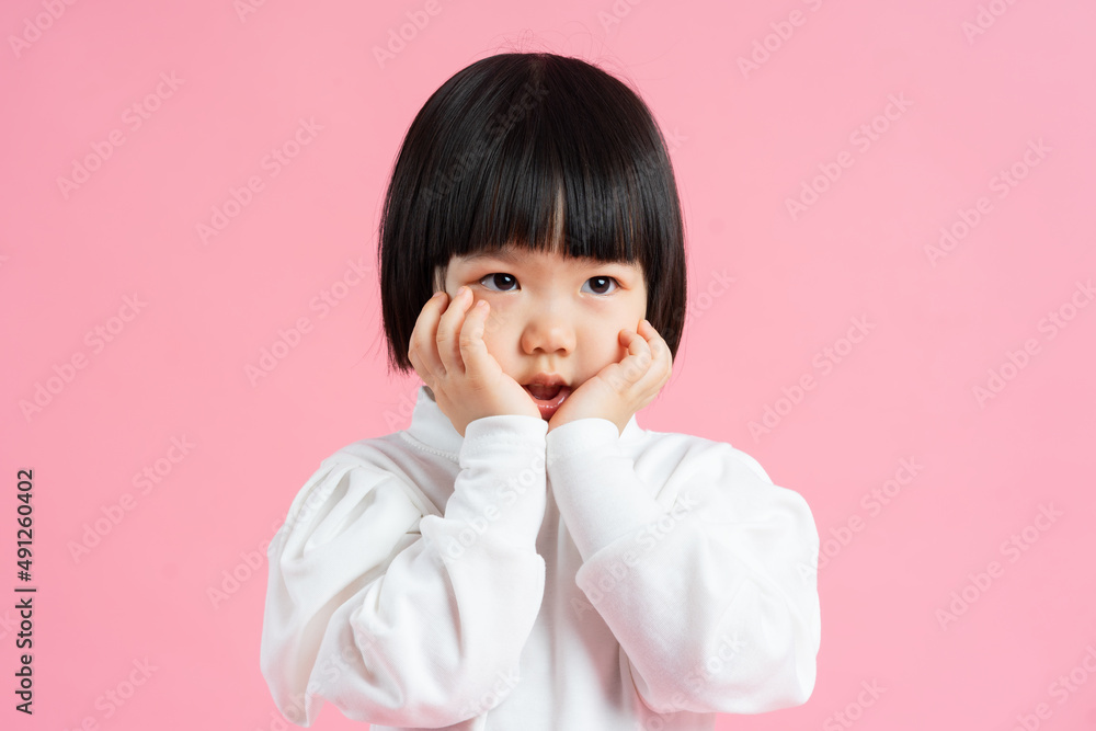 lovely baby girl portrait, isolated on pink background lovely baby girl portrait, isolated on pink background