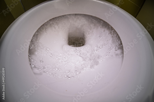 Close-up of a toilet bowl in a hundredth © ivan