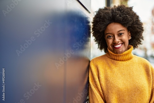 Young african american girl smiling happy standing at the city. © Krakenimages.com