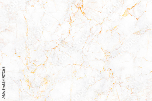 Gold marble texture background. Used in design for skin tile ,wallpaper, interiors backdrop. Natural patterns. Picture high resolution. Luxurious background