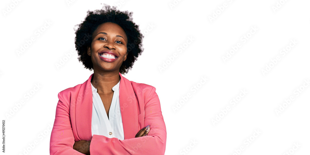 African american woman with afro hair wearing business jacket happy face smiling with crossed arms looking at the camera. positive person. African american woman with afro hair wearing business jacket happy face smiling with crossed arms looking at the camera. positive person.