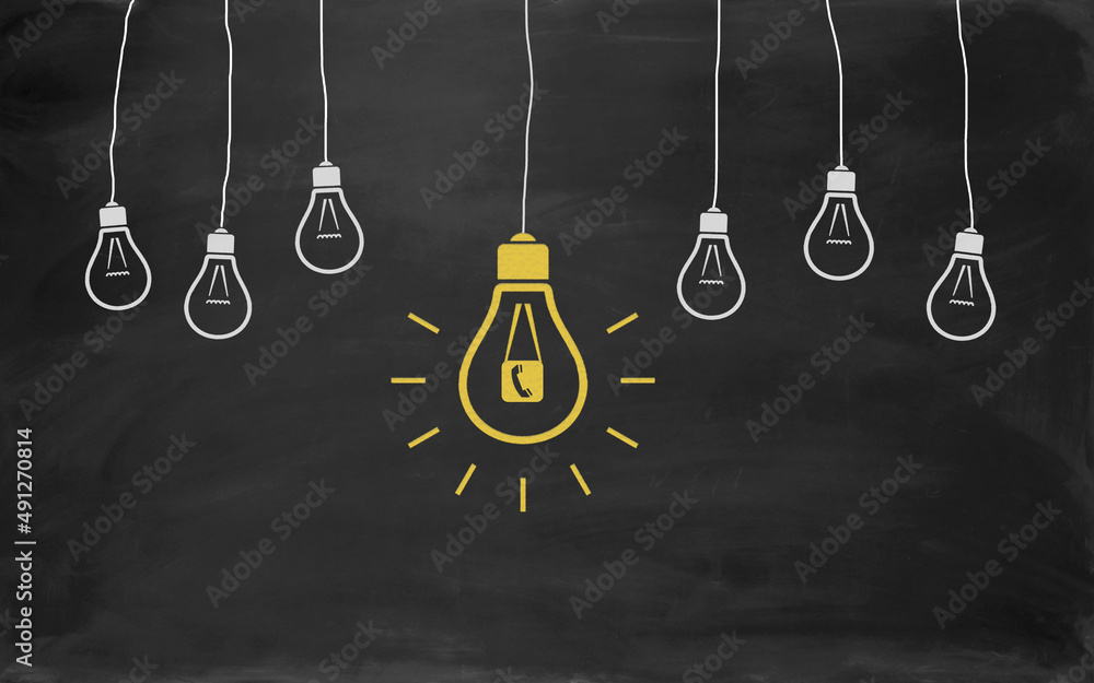 Telephone Symbol Bulb Concept Drawing with Chalk on Blackboard Telephone Symbol Bulb Concept Drawing with Chalk on Blackboard