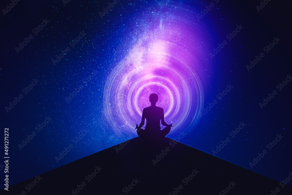 Young woman meditating with milky way background Young woman meditating with milky way background