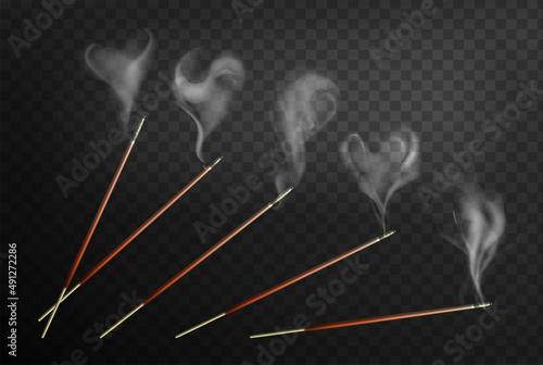 Joss incense sticks with steam smoke realistic 3d vector illustration. Wooden agarbatti isolated on dark background. Indian scented burning wooden stick for aromatherapy, meditation or room fragrance. photo