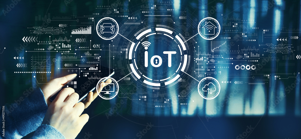 IoT theme with person using a smartphone IoT theme with person using a smartphone