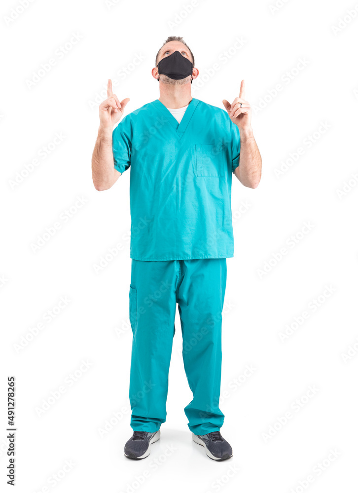 Doctor Wearing Face Mask Points Upwards