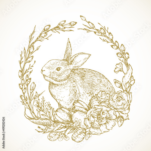 Hand Drawn Cute Easter Bunny in a Flowers Wreath Vector Illustration. Little Rabbit in a Willow Twigs Frame Abstract Sketch. Spring Holiday Engraving Style Drawing. Isolated