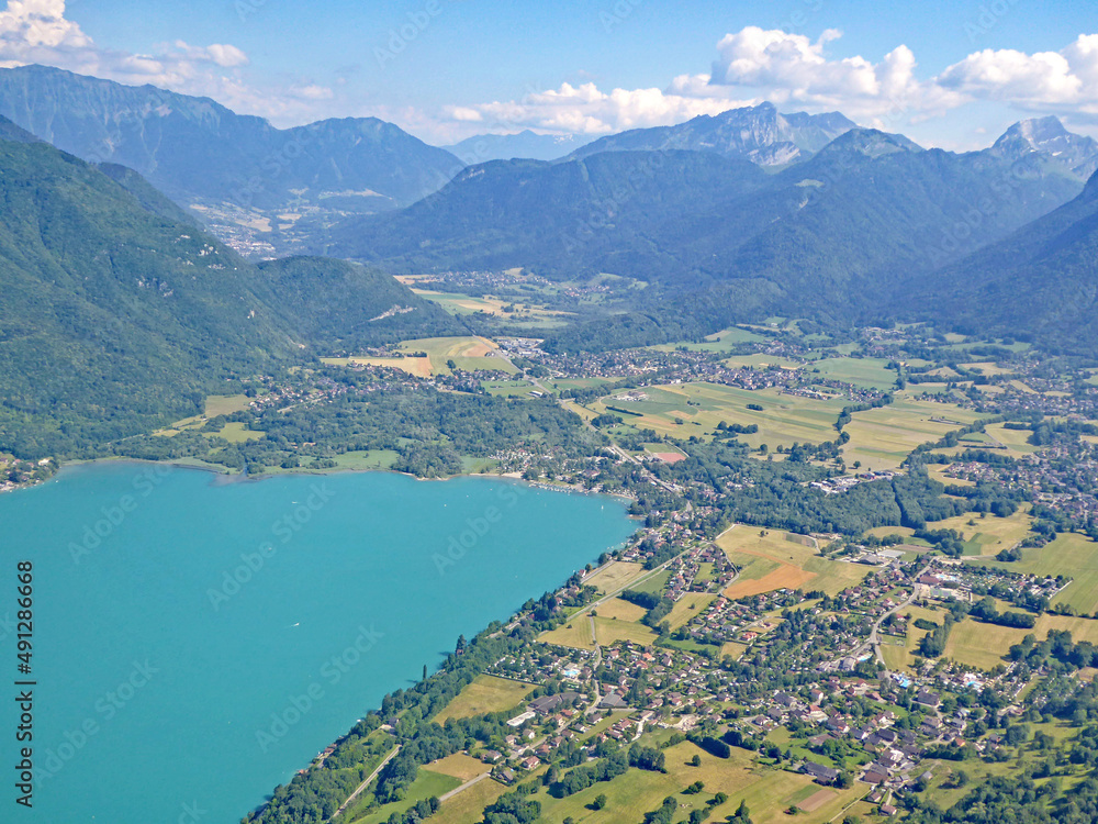 Paragliding above Lake Annecy in the French Alps