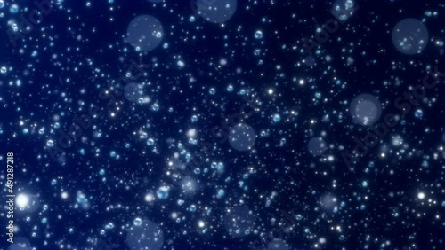 Wallpaper Mural Blue Air Bubbles Background. Air bubbles and glowing bokeh particles move from left to right on a dark blue background. Torontodigital.ca