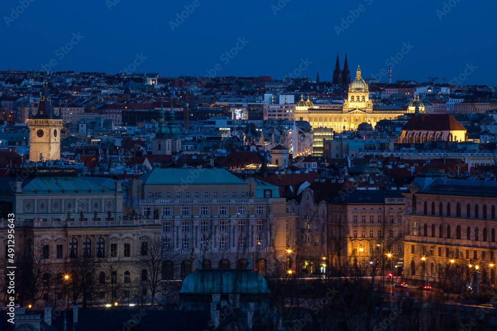 evening view of the historical center of Prague - Old Town and the illuminated National Museum
