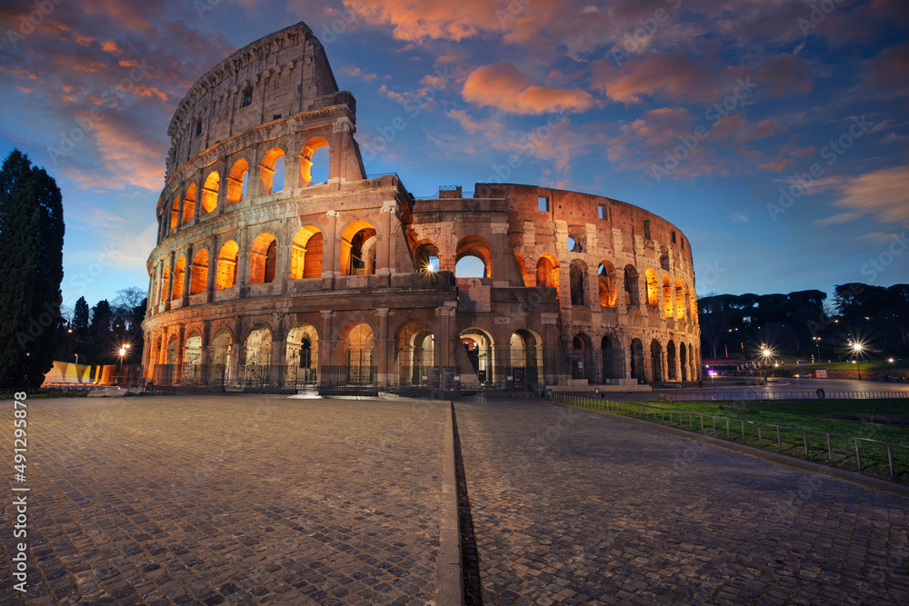 Colosseum, Rome, Italy. Image of iconic Colosseum in Rome, Italy at beautiful sunrise.