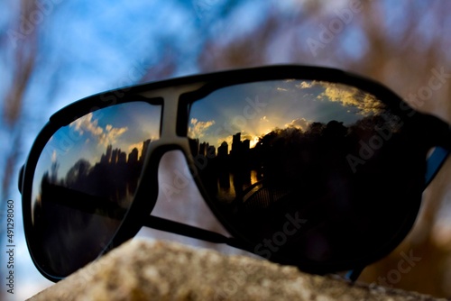 Sunglasses reflecting a sunset in Atlanta 