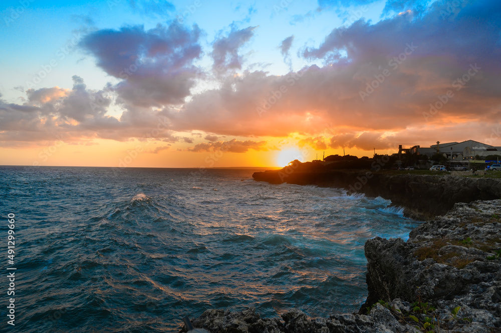 Beautiful view of ocean sunset. Sunset at sea. Evening on Malecon Santo Domingo