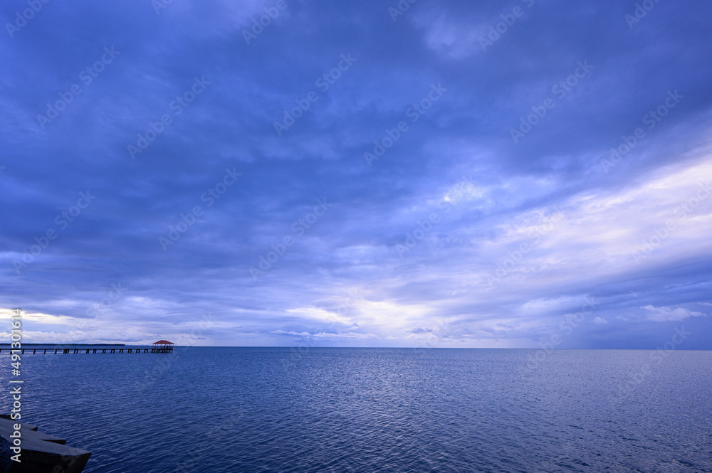 Background on evening clouds over the ocean, photography, wide angle, copy space