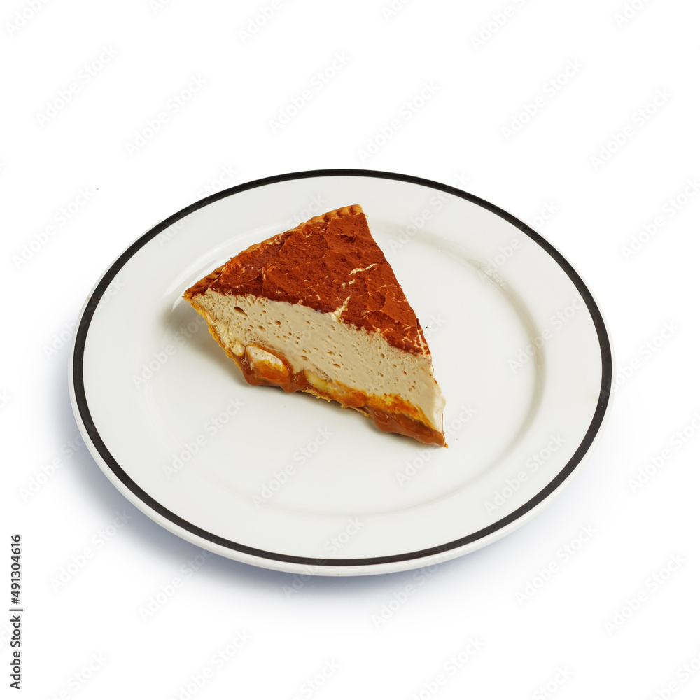 Dessert cake on a color plate. Top view. Copy space. isolated on white Dessert cake on a color plate. Top view. Copy space. isolated on white