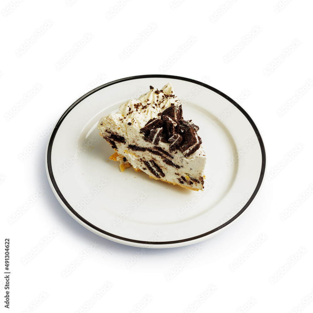 Dessert cake on a color plate. Top view. Copy space. isolated on white