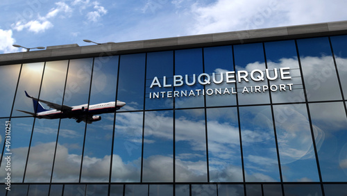 Fotografía Airplane landing at Albuquerque USA, New Mexico airport mirrored in terminal
