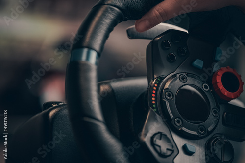 Fototapet Technology, gaming, entertainment and people concept - young man playing car rac