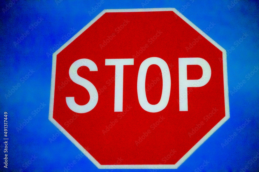 Red Stop Sign with Night Sky in USA Red Stop Sign with Night Sky in USA