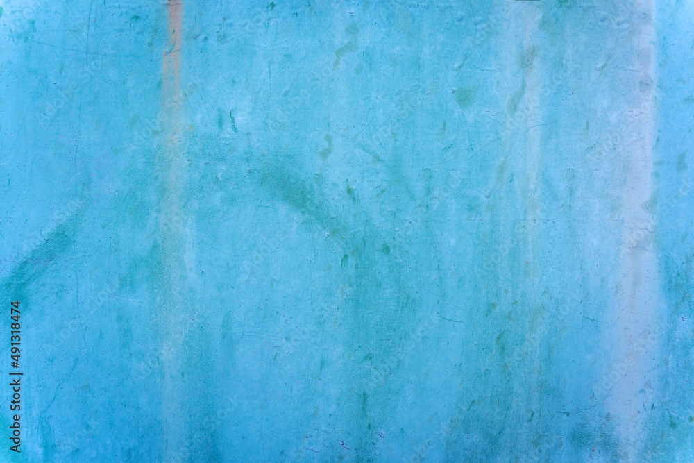 Tuquoise cyan blue aged destroyed weathered metal surface door, background texture, copy space