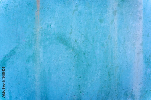 Tuquoise cyan blue aged destroyed weathered metal surface door, background texture, copy space