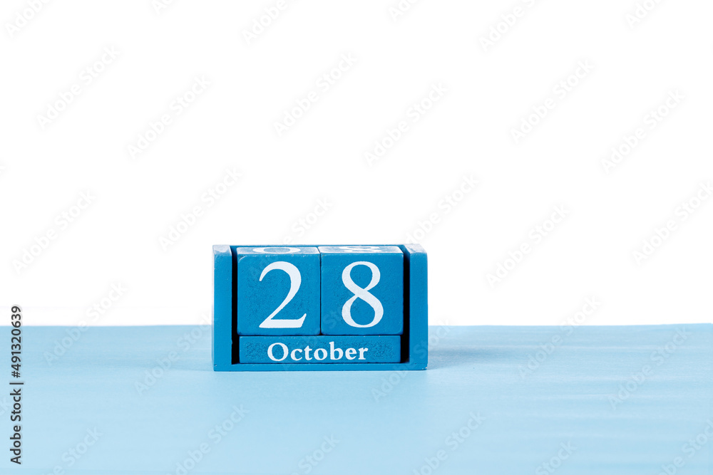 Wooden calendar October 28 on a white background Wooden calendar October 28 on a white background