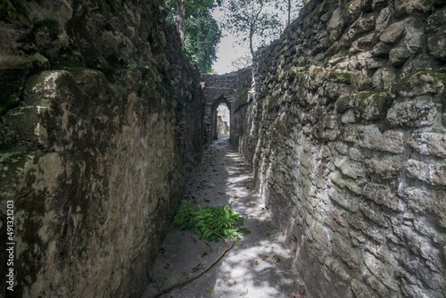 Narrow path at Maya ruins 'Cahal Pech' in San Ignacio, Belize