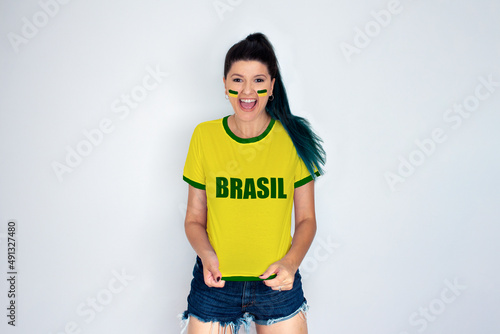 Woman cheering for Brazil's team