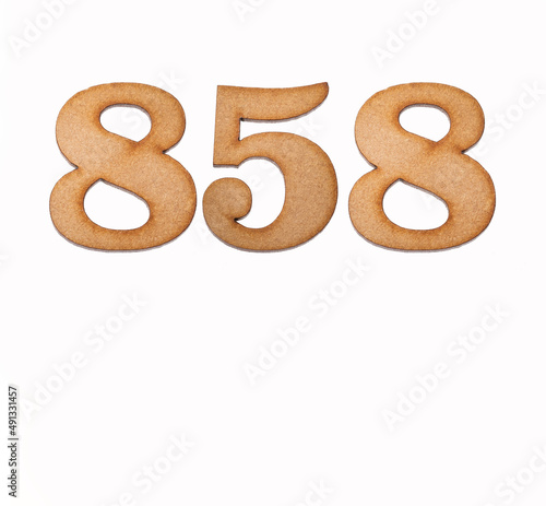 Number 858 in wood, isolated on white background