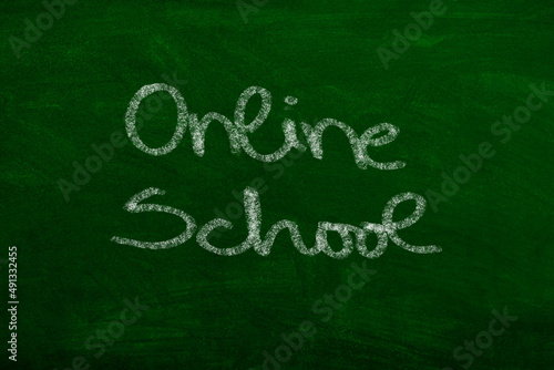 Online School signn on School boar hand written with chalk 