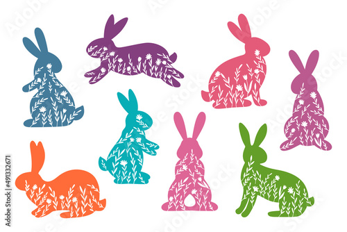 Happy Easter vector illustrations of bunnies, rabbits icons, decorated with flowers, floral, wildflowers.