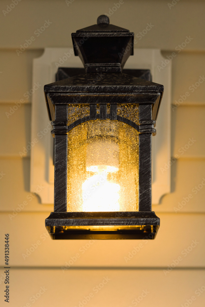 Electric lamp hanging on porch Electric lamp hanging on porch