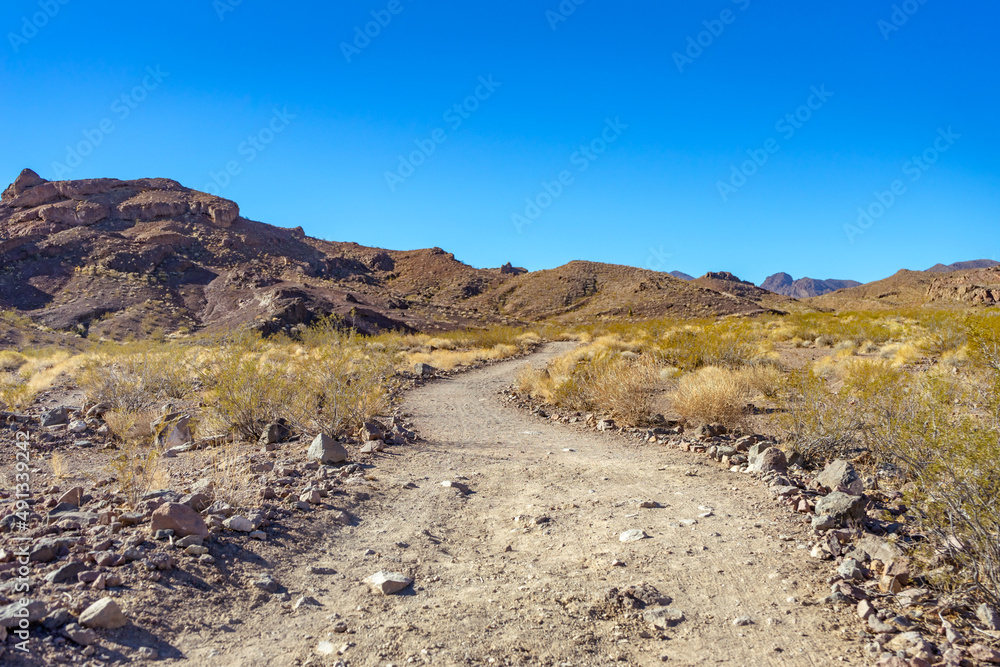 Uphill desert hiking trail in Southern Nevada