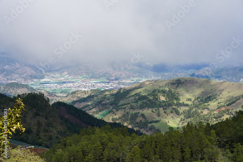 Dramatic image of the Caribbean agricultural town of Constanza, Dominican Republic, from the mountains.