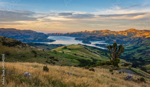 Early Autumn sunrise over Akaroa Harbour, New Zealand