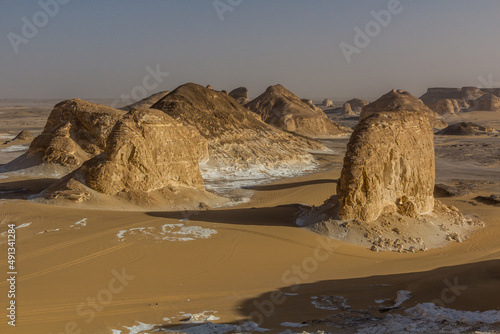 Rock formations of El Aqabat (Agabat) valley in the White Desert, Egypt photo