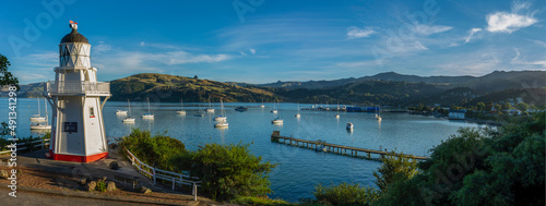 Early Autumn sunrise over Akaroa Harbour, New Zealand photo