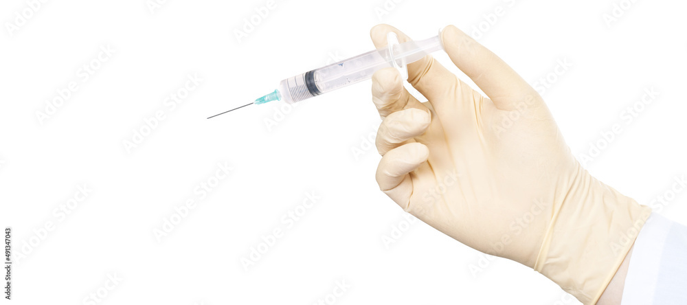 Hand holding syringe with vaccine against corona virus. Hand holding syringe with vaccine against corona virus.